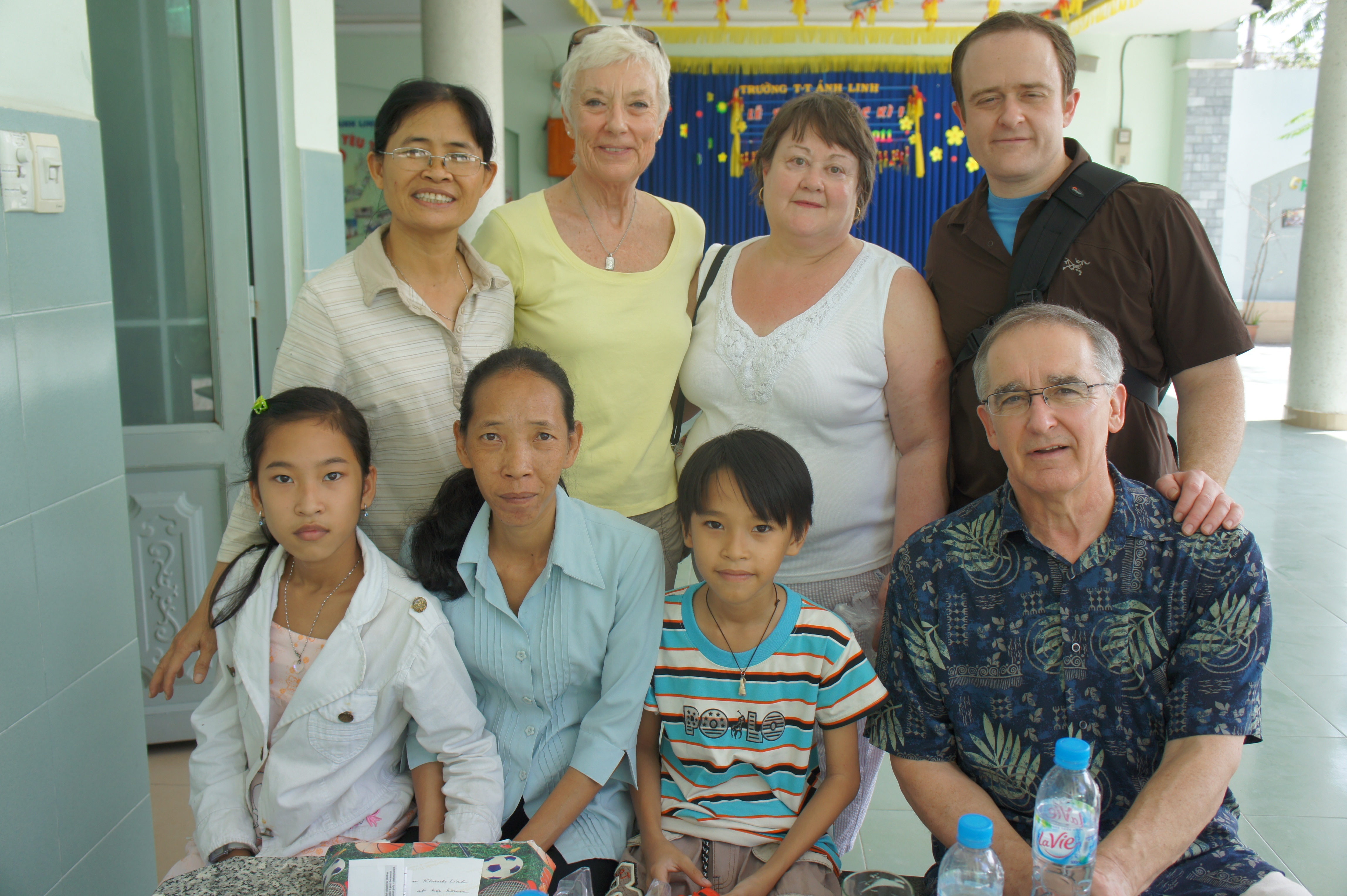 Bridges to Learning Jerilyn Hirsch  and Jim Sherman and sponsored kid at Anh Linh School. Saigon HCMC Vietnam. Teachers and family. 
