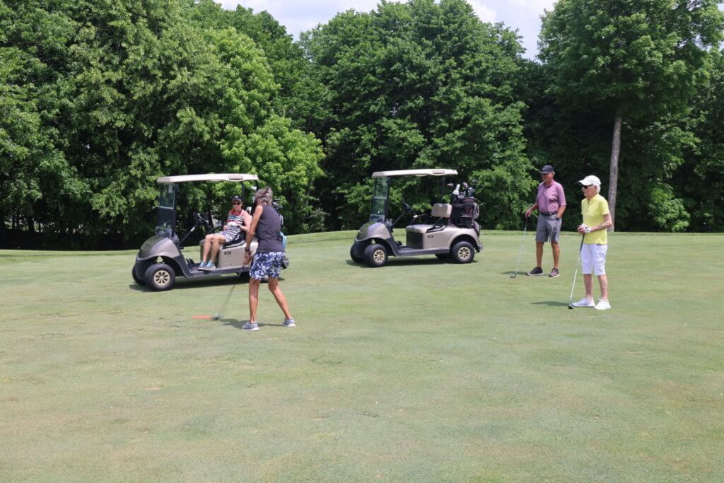 B2L founder, Jerri Hirsh, and her foursome, making a shot at the 4th Annual Bridges to Learning Charity Golf Tournament. The Wilds Golf Club. Prior Lake MN. Raising money to educate poor children in Vietnam.