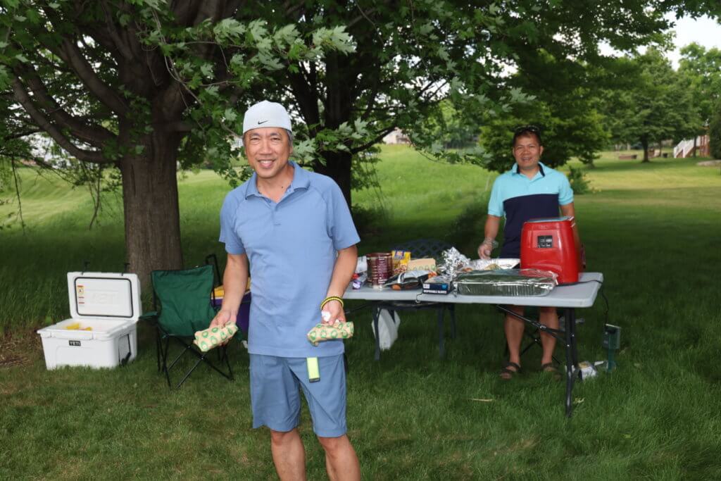 Volunteers set up egg rolls for golfers at the Wilds Golf Club course at the 4th Annual Bridges to Learning Golf Tournament, Prior Lake Minnesota. Raising funds to educate and care for poor children in Vietnam.