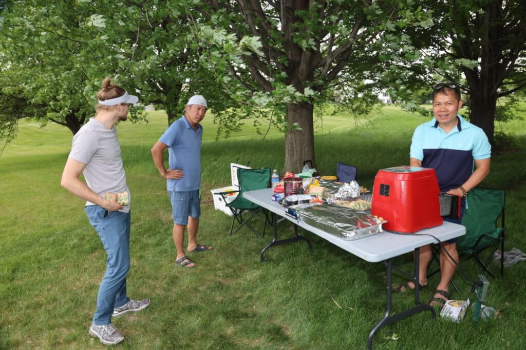 Volunteers set up egg rolls for golfers at the Wilds Golf Club course at the 4th Annual Bridges to Learning Golf Tournament, Prior Lake Minnesota. Raising funds to educate and care for poor children in Vietnam.