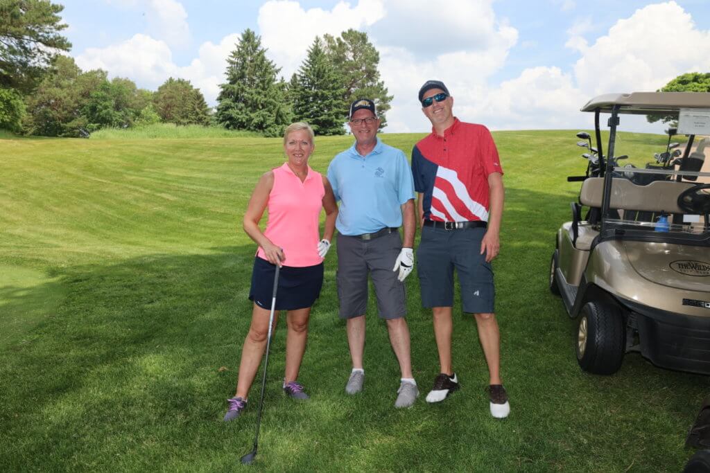 Golfers posing for a photo at the 4th Annual Bridges to Learning Charity Golf Tournament. The Wilds Golf Club. Prior Lake MN.