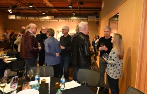 Guests mingle at Bridges to Learning 2022 Wine Tasting. Raising funds to educate impoverished children in Vietnam.