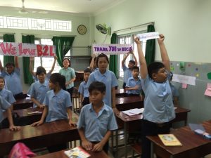 Thank you notes for Bridges to Learning held by children at Anh Linh School, Vietnam.