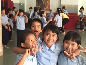 Students smiling and laughing at Anh Linh School, Vietnam.