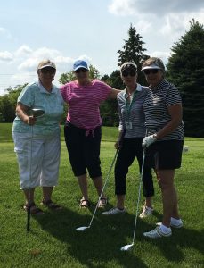 senior women golfing stonebrooke golf course shakopee minnesota charity tournament sunny afternoon